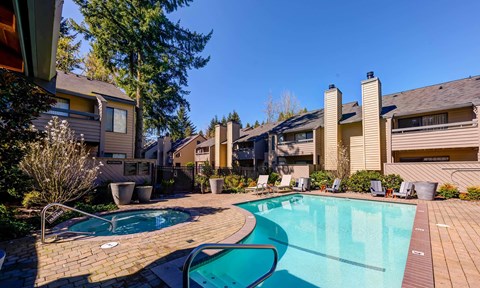 a glistening swimming pool at The Lakes Apartments, Bellevue, 98007